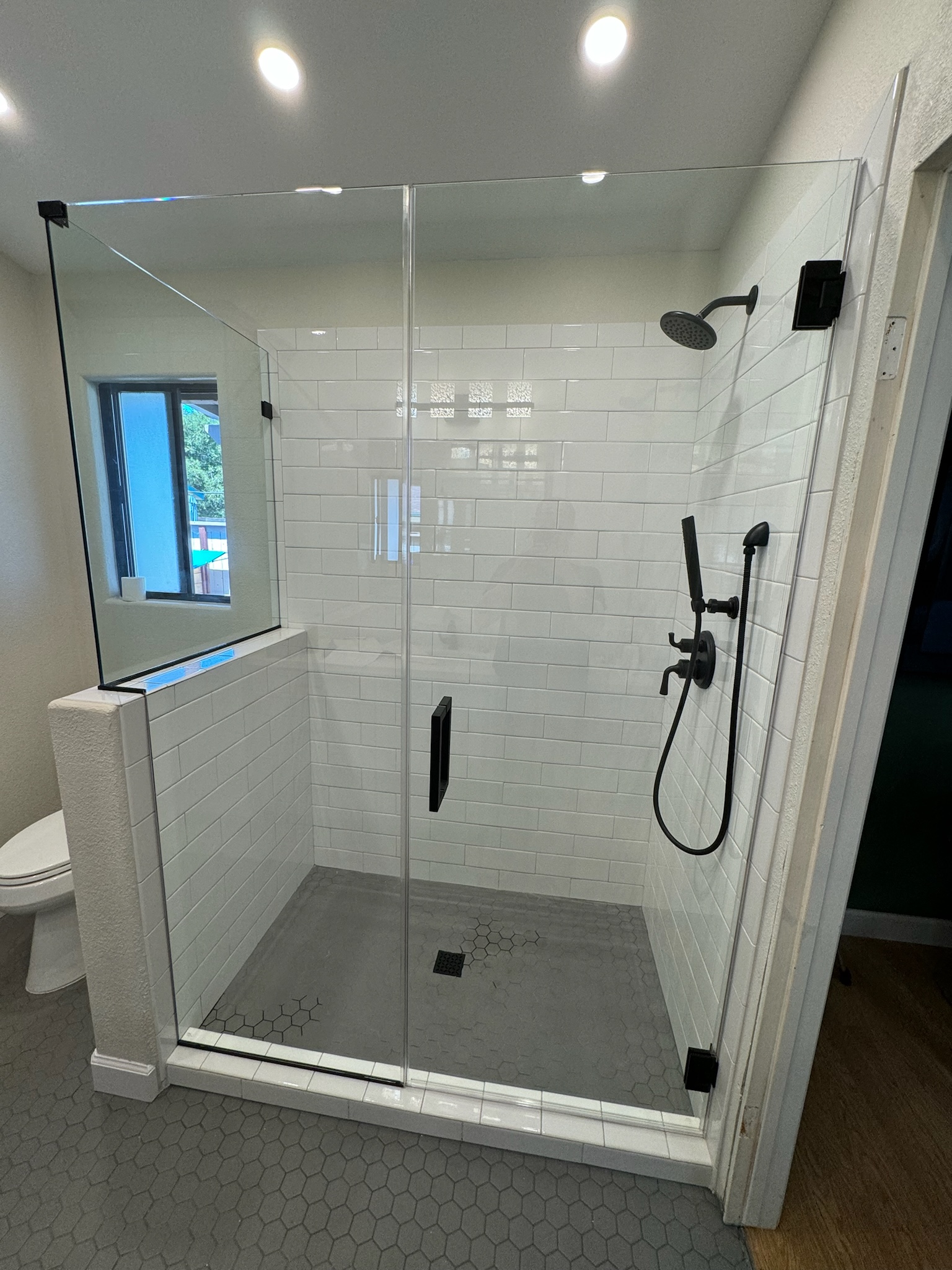 Frameless shower door